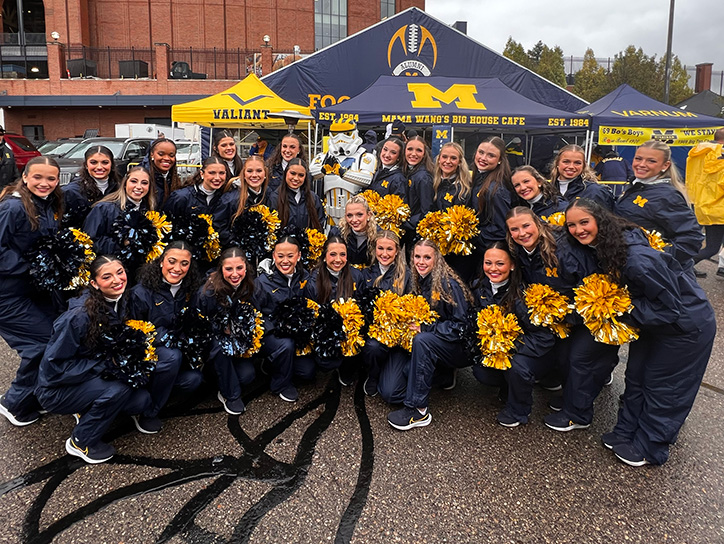 UM cheerleaders and stormtrooper