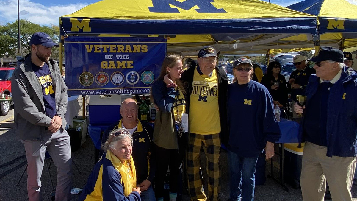 elfring with group in front of VOG sign