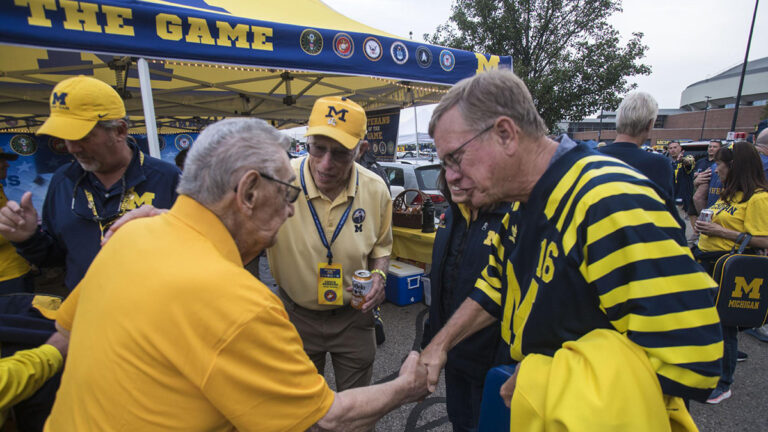 george shaking hands