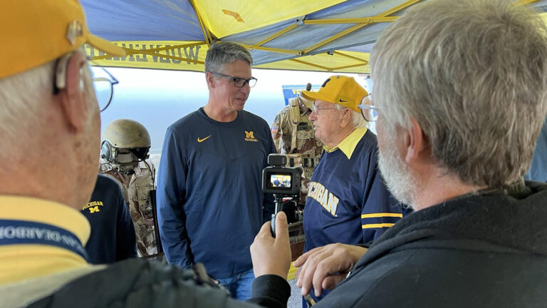 martin speaking with other vets