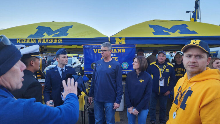 martin with wife and service men vog