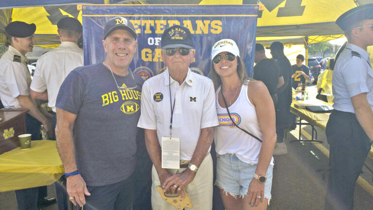 morrison with chuck in front of vog sign