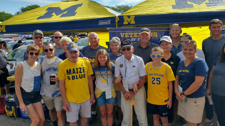 morrison with family in front of tent