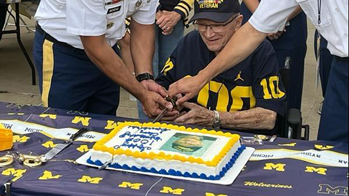 sperkoski cutting birthday cake